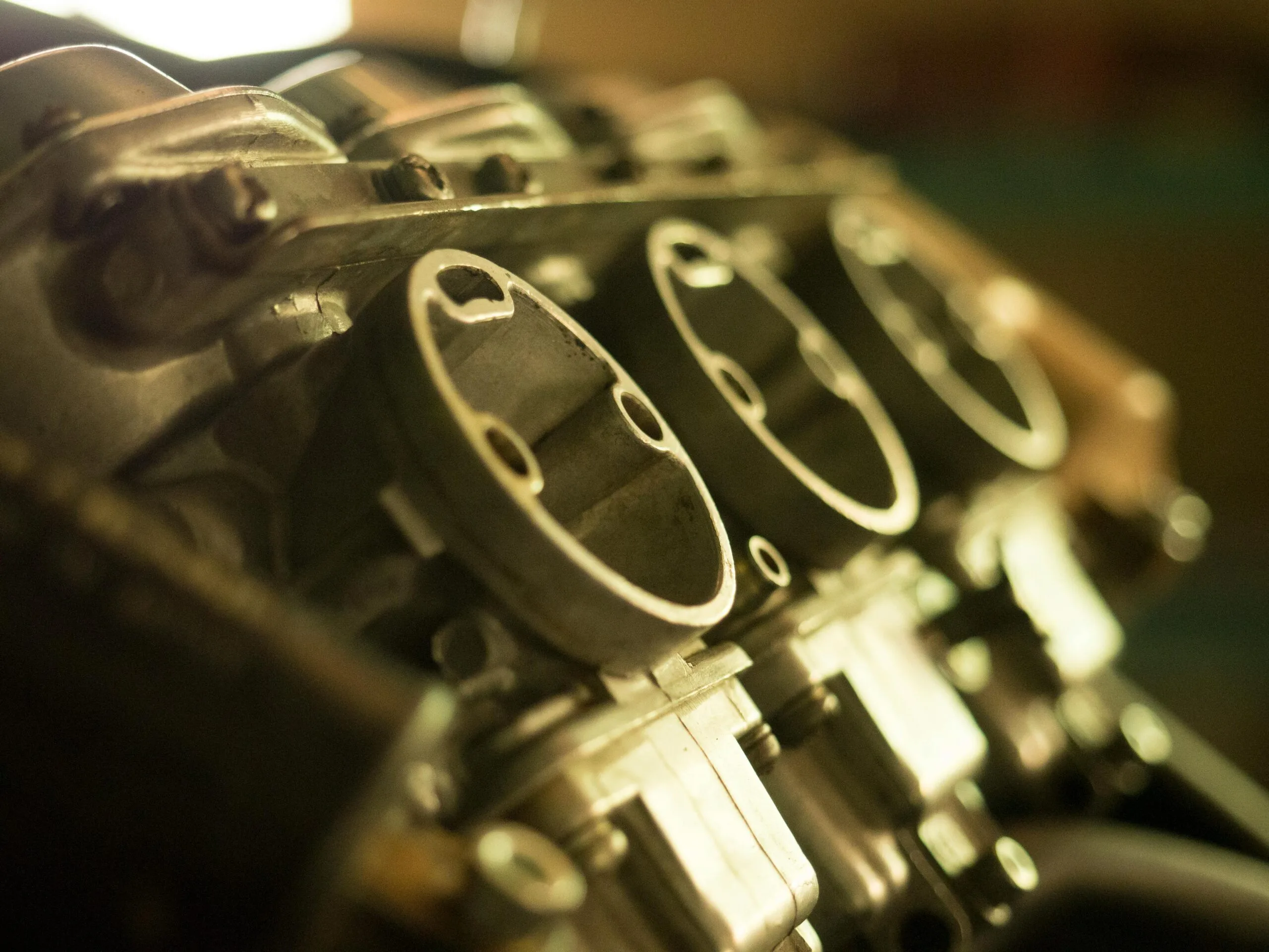 Detailed view of a metal engine component showcasing precise engineering.